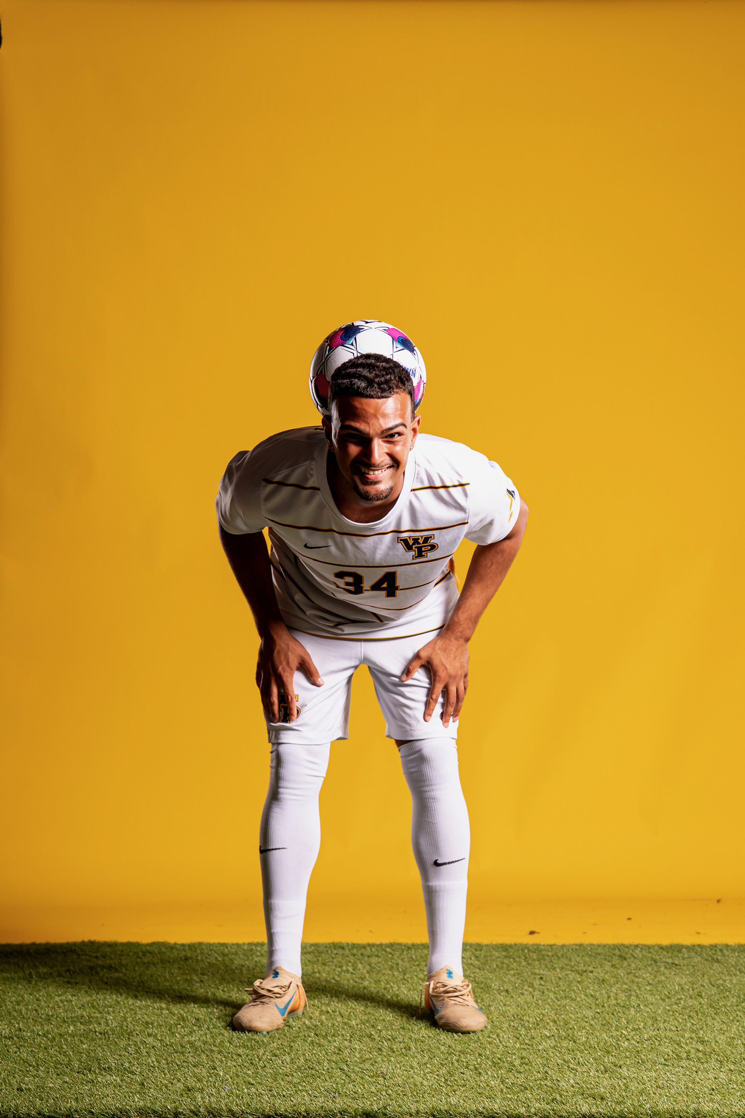 Joueur Next Player en maillot de son équipe universitaire aux États-Unis